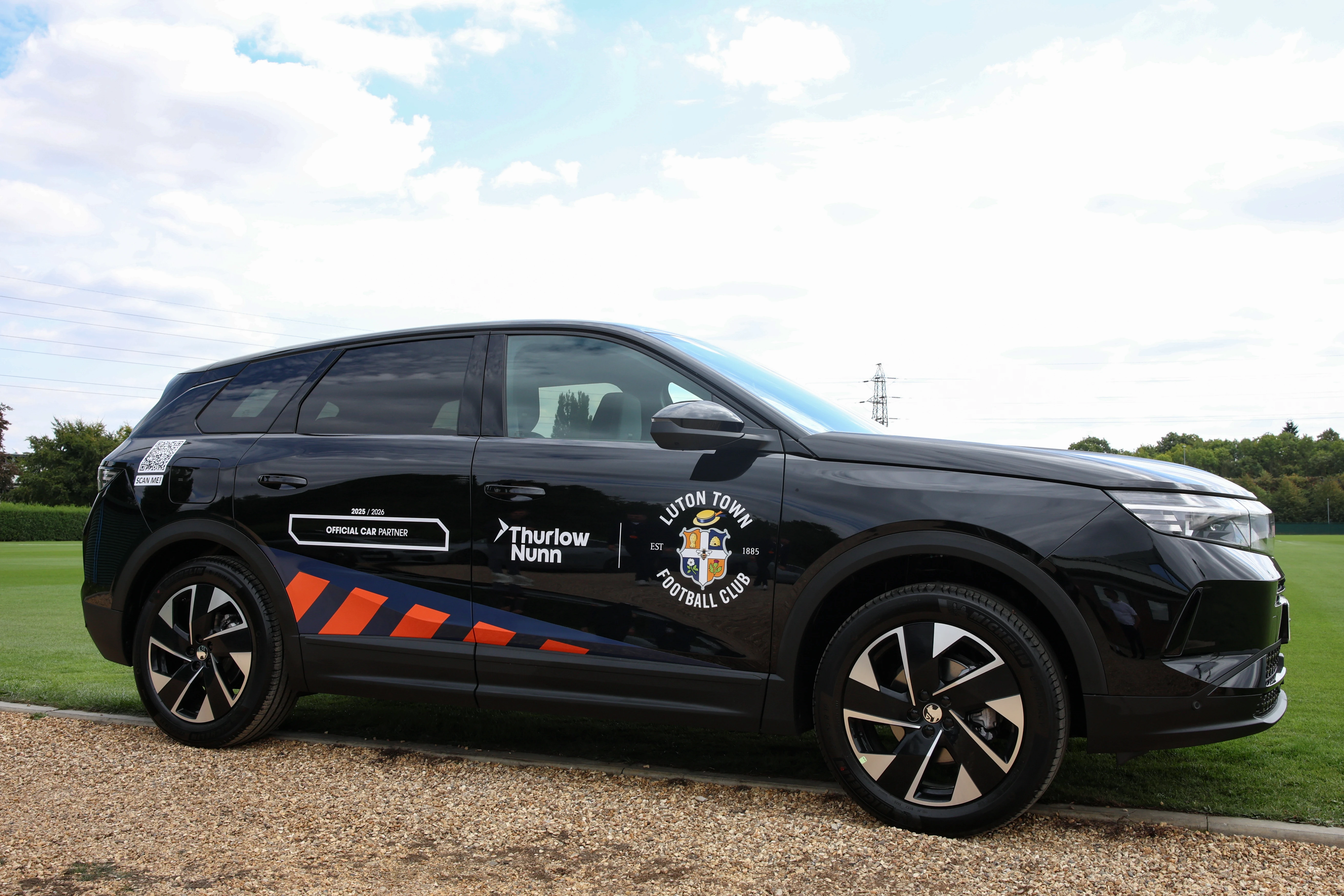 A Thurlow Nunn and Luton Town branded car.