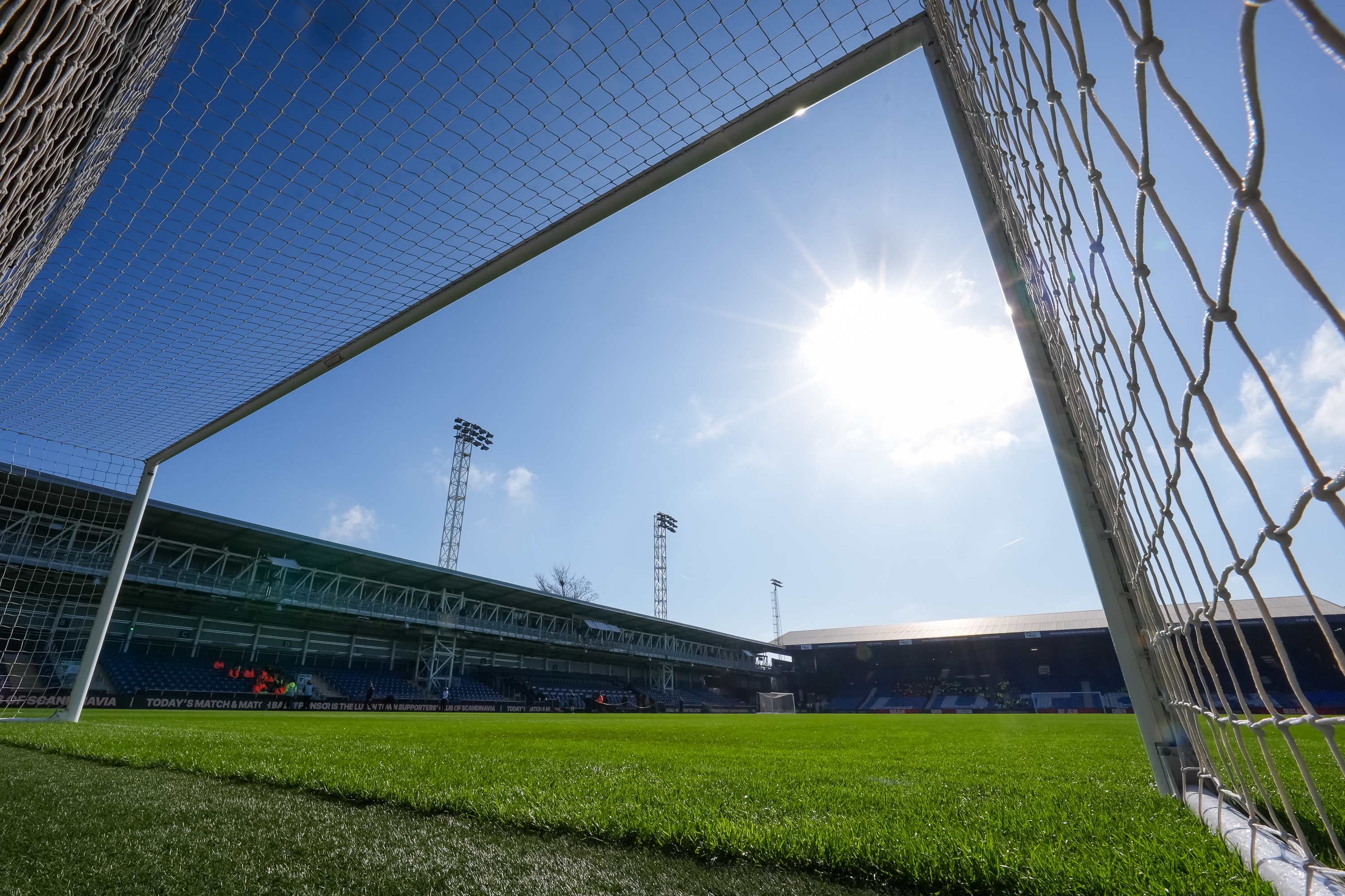 A view of the Bobbers Stand in the sunshine from the goal at the Oak Road end of Kenilworth Road.