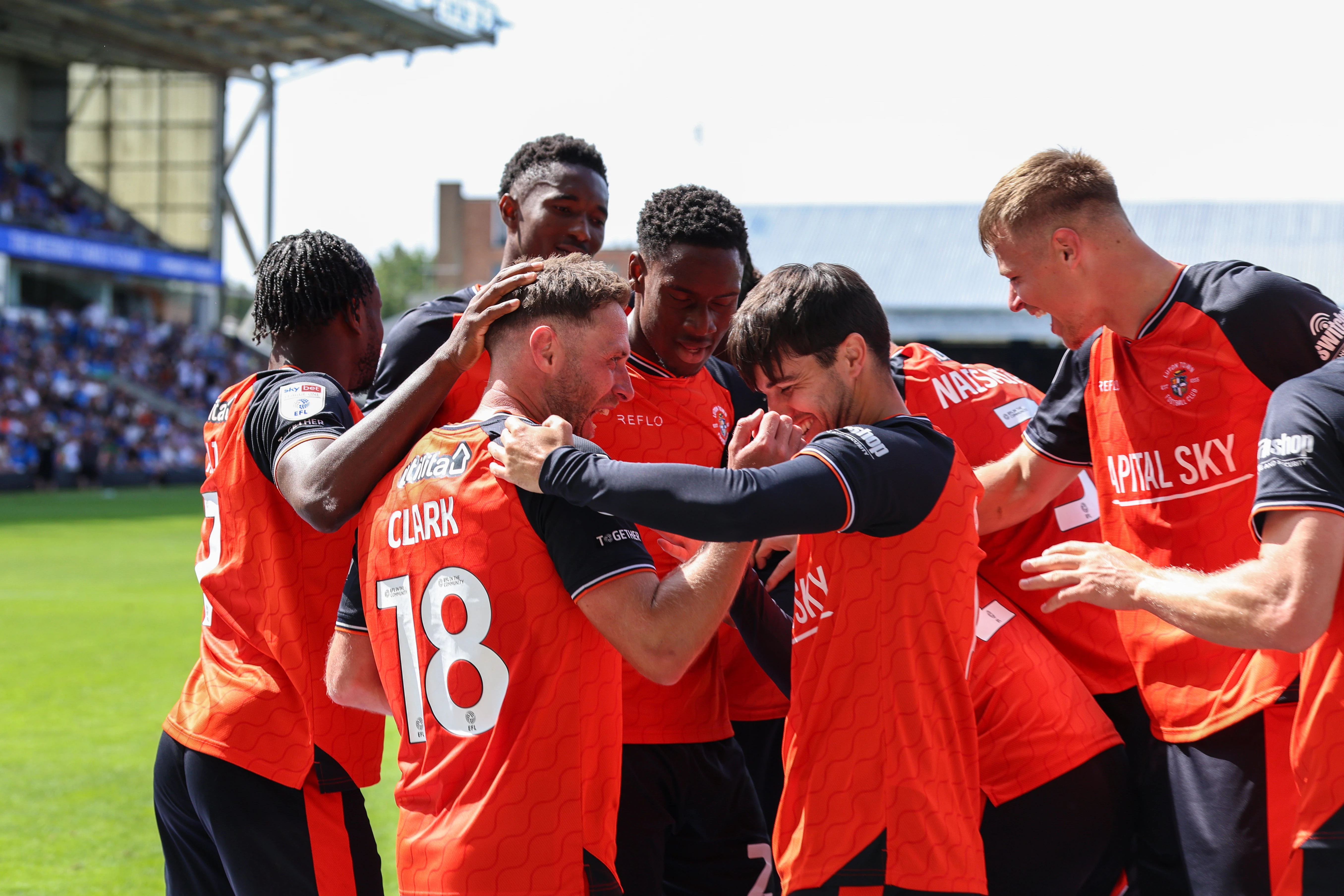 Jordan Clark and Liam Walsh celebrate the former's goal in the 2-0 win at Peterborough.