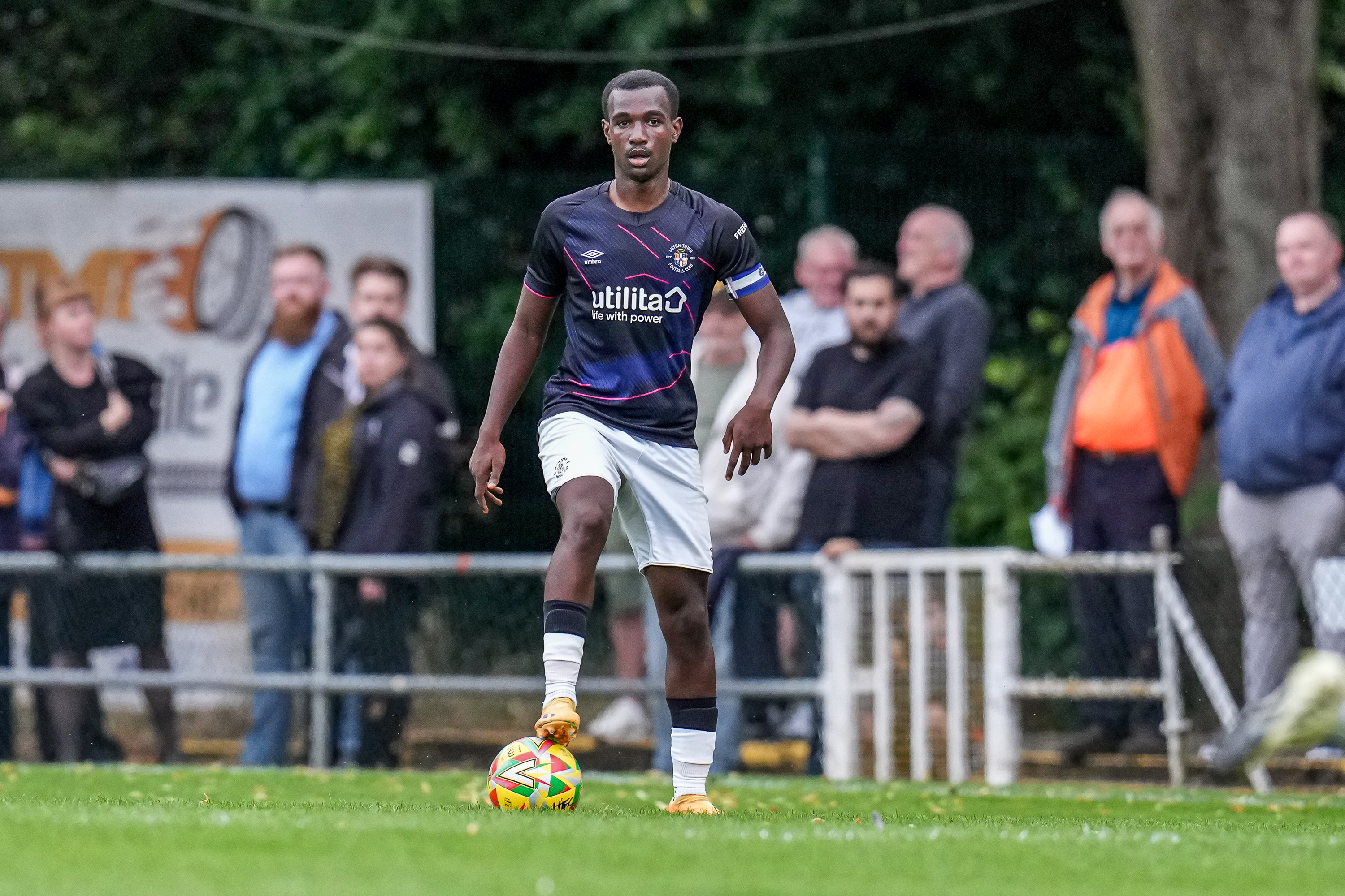 Calude Kayibanda in action for Luton Town U21s in a pre-season friendly at Hitchin Town in 2024