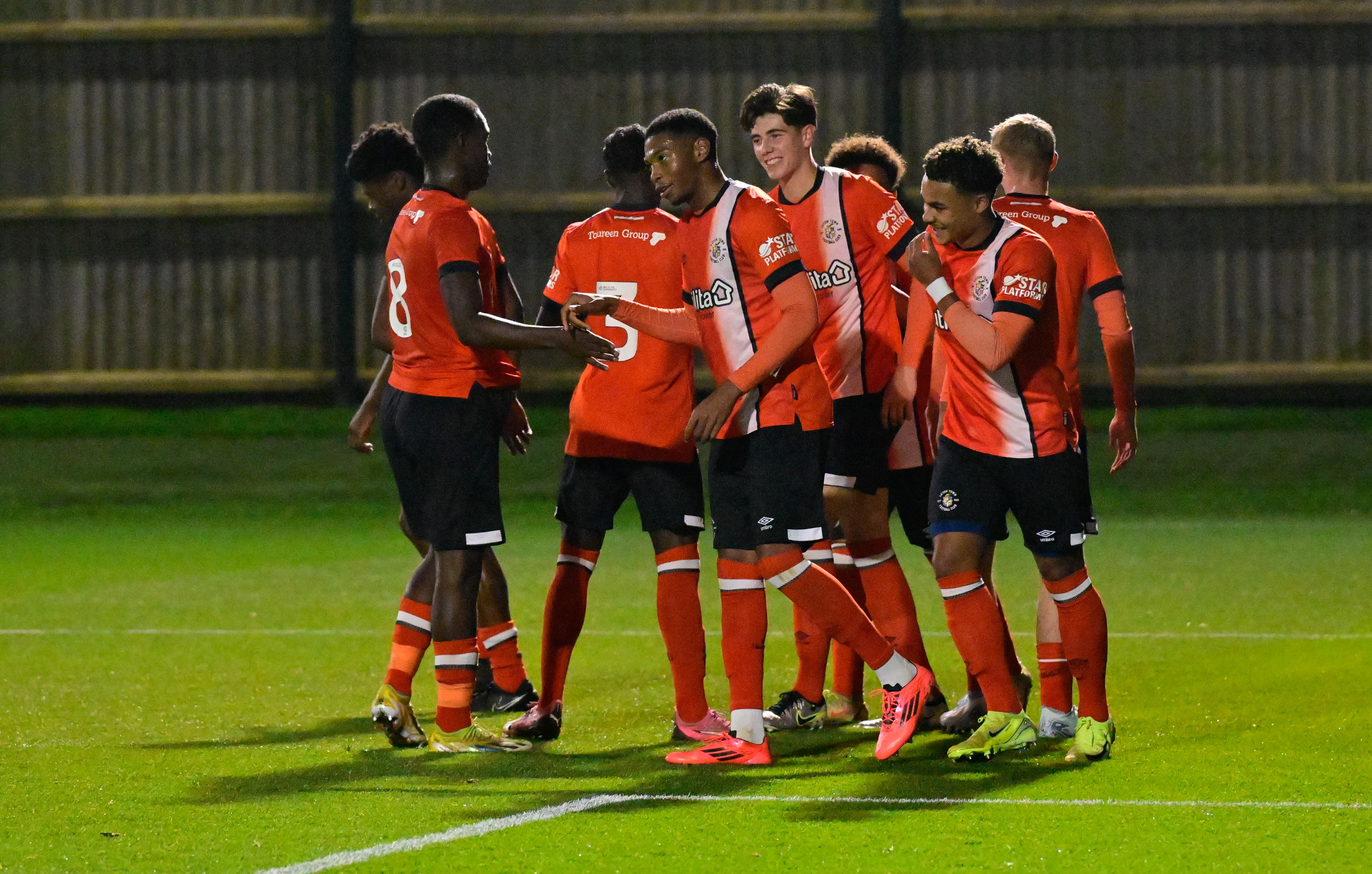 Zack Nelson celebrates his penalty in the 2-1 Premier League Cup win at Brighton