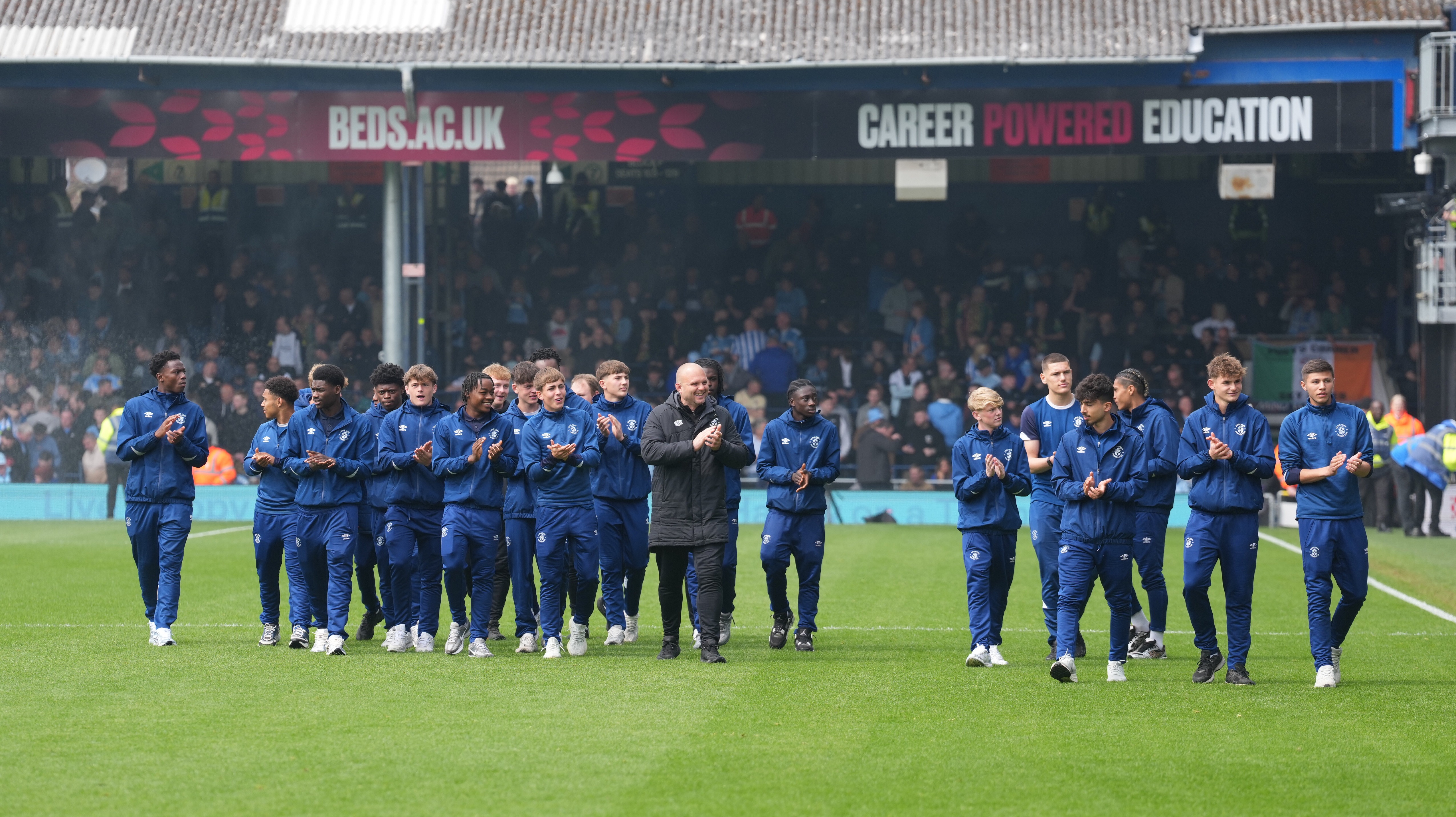 The Luton Town Under-18 squad do a lap of honour at half-time of the game against Coventry after winning the EFL Youth Alliance South Division title in midweek thanks to Oxford's defeat at Portsmouth.