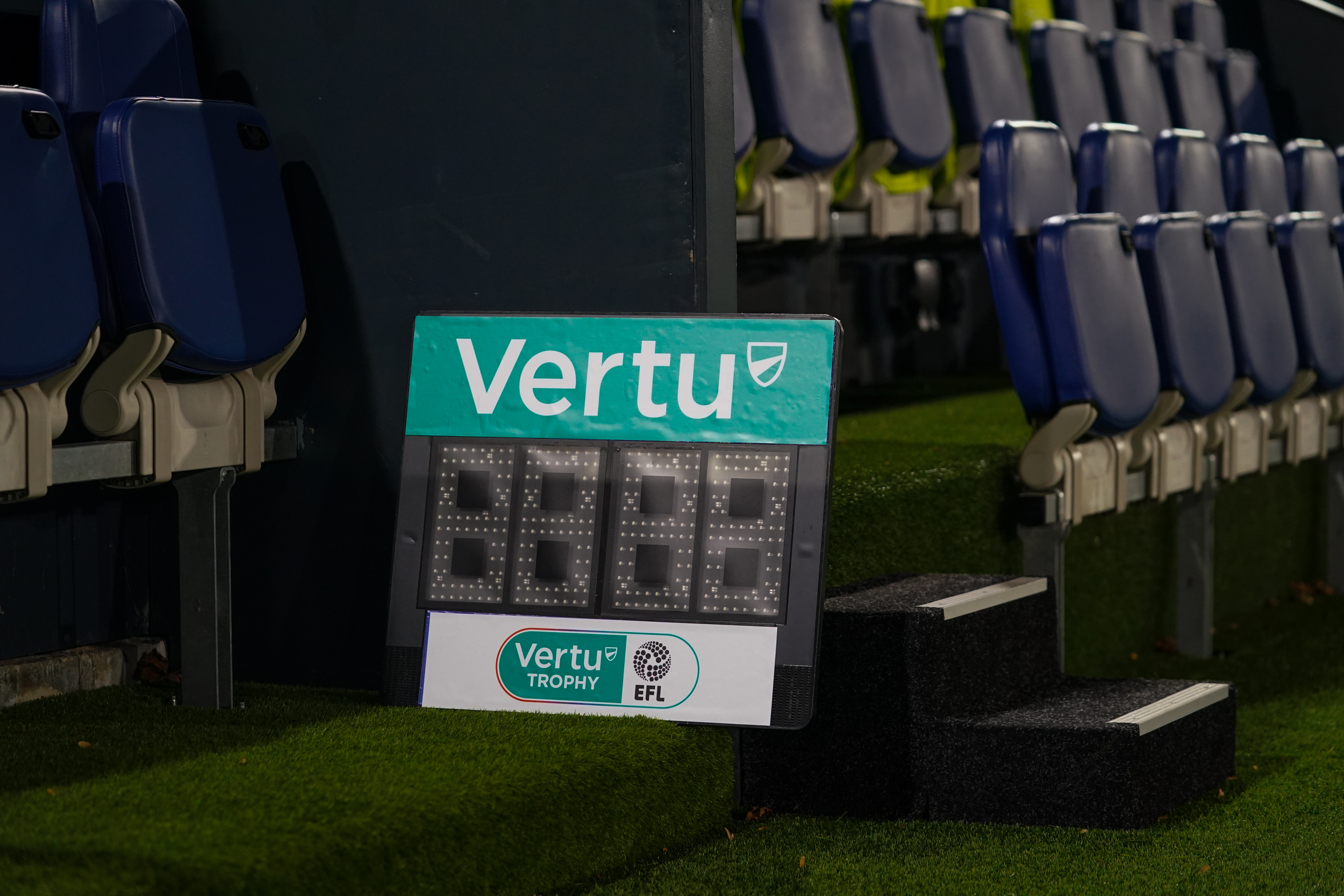 An image of the fourth officials subs' board at Kenilworth Road with the Vertu branding.