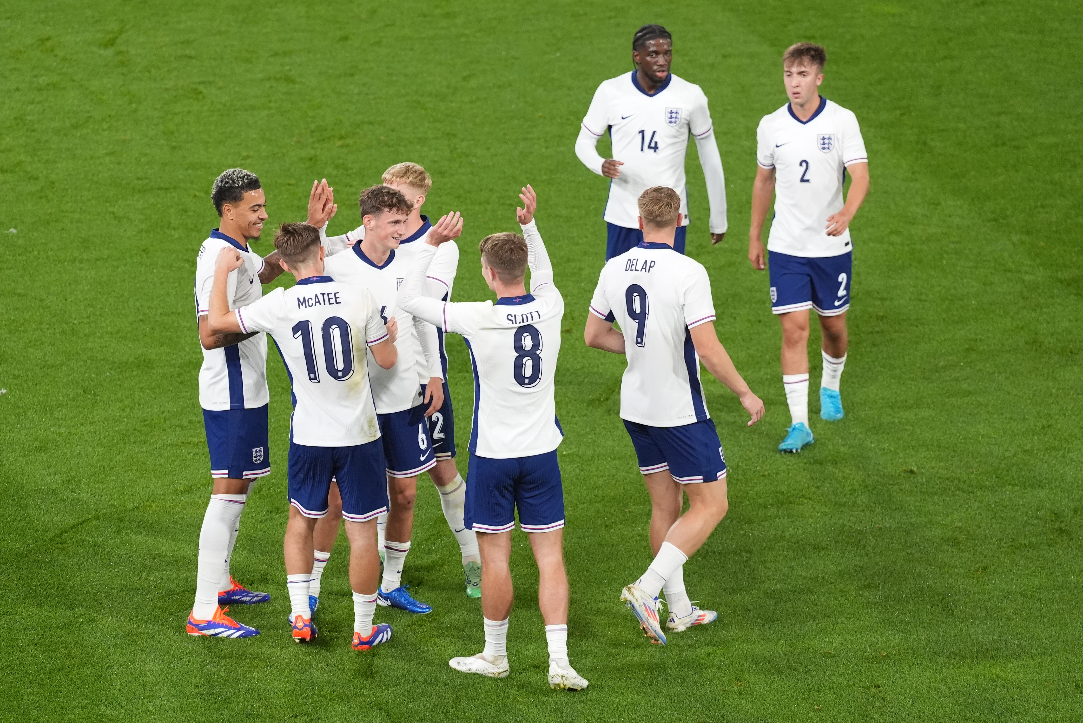 England Under-21s celebrate one of their four goals against Austria at Kenilworth Road