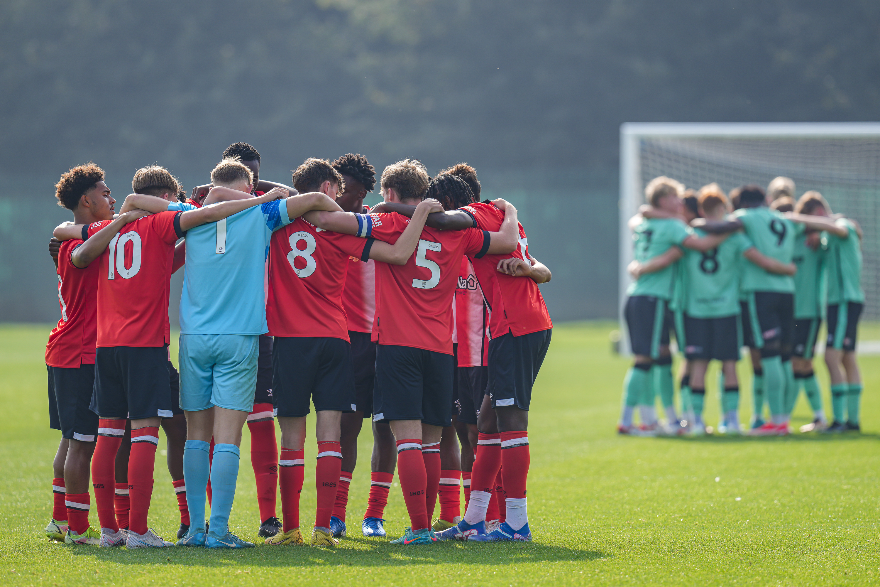 Youth Team huddle