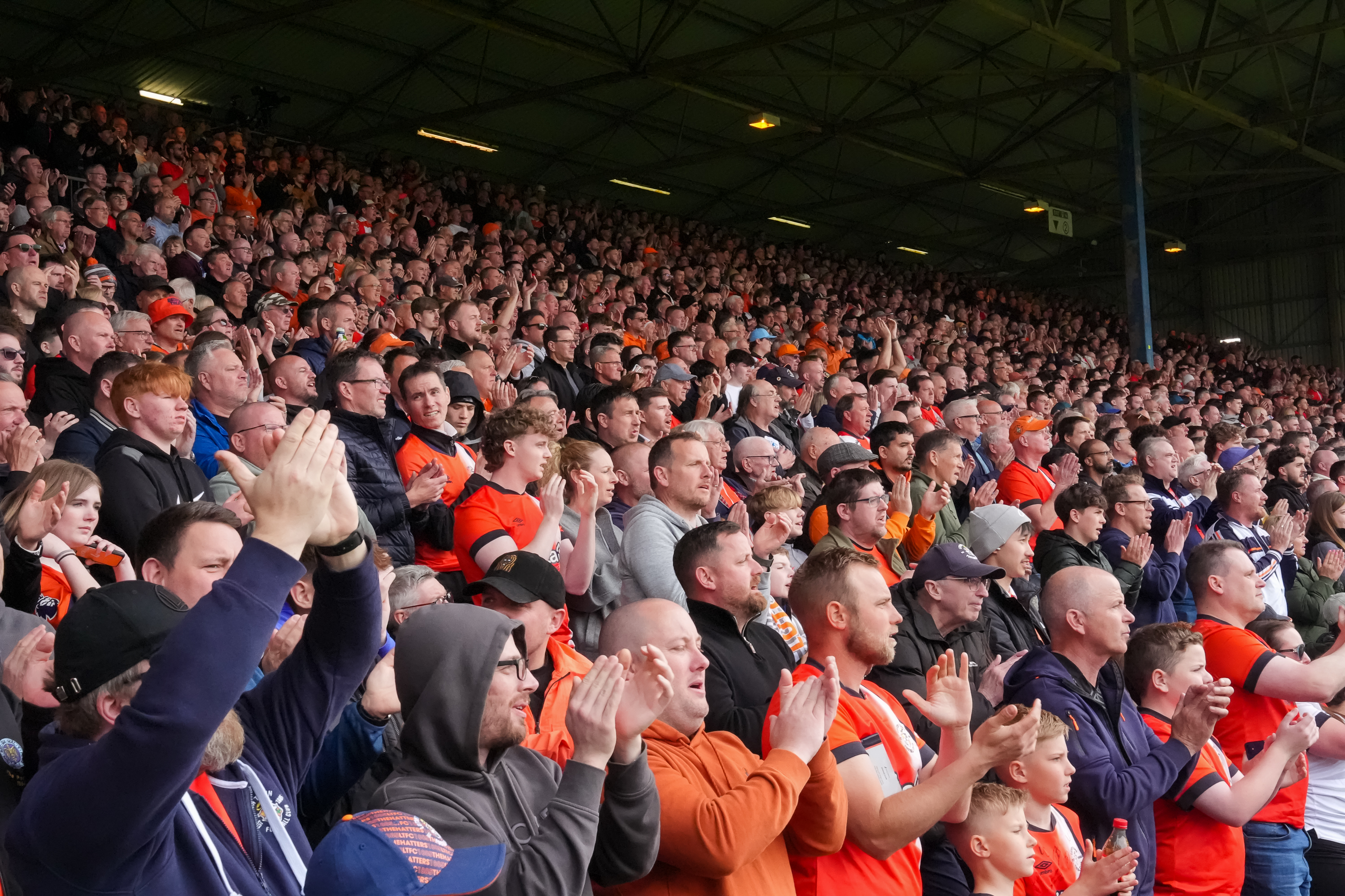 Luton Town supporters applaud during the 1-0 win over Coventry in April 2025.