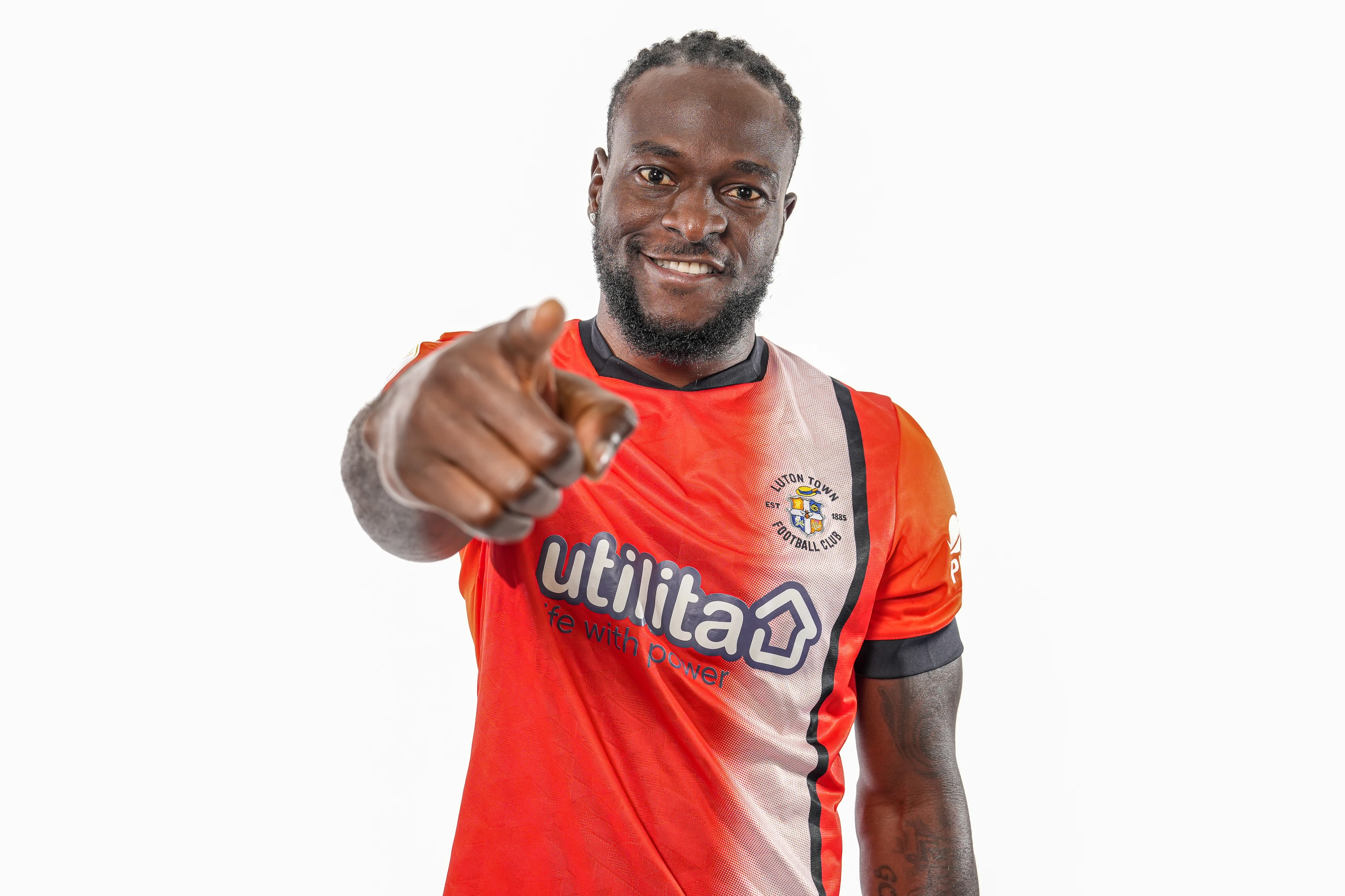 Victor Moses in a Luton shirt after signing a permanent contract