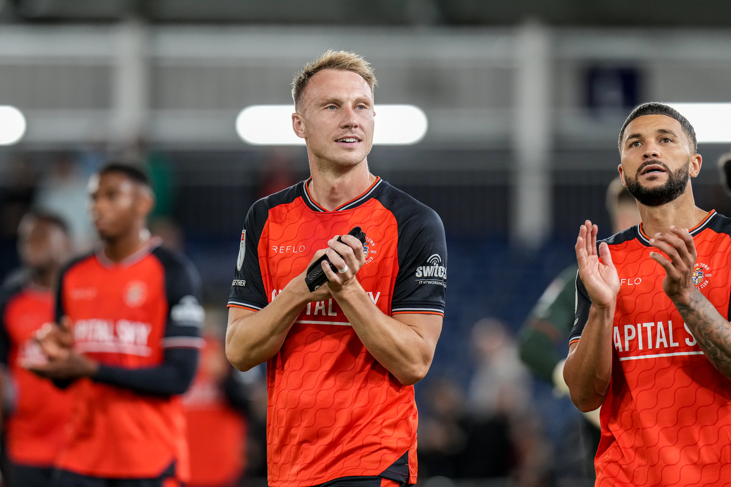 Cauley Woodrow applauds the Town fans at the end of the 1-0 win over AFC Wimbledon.