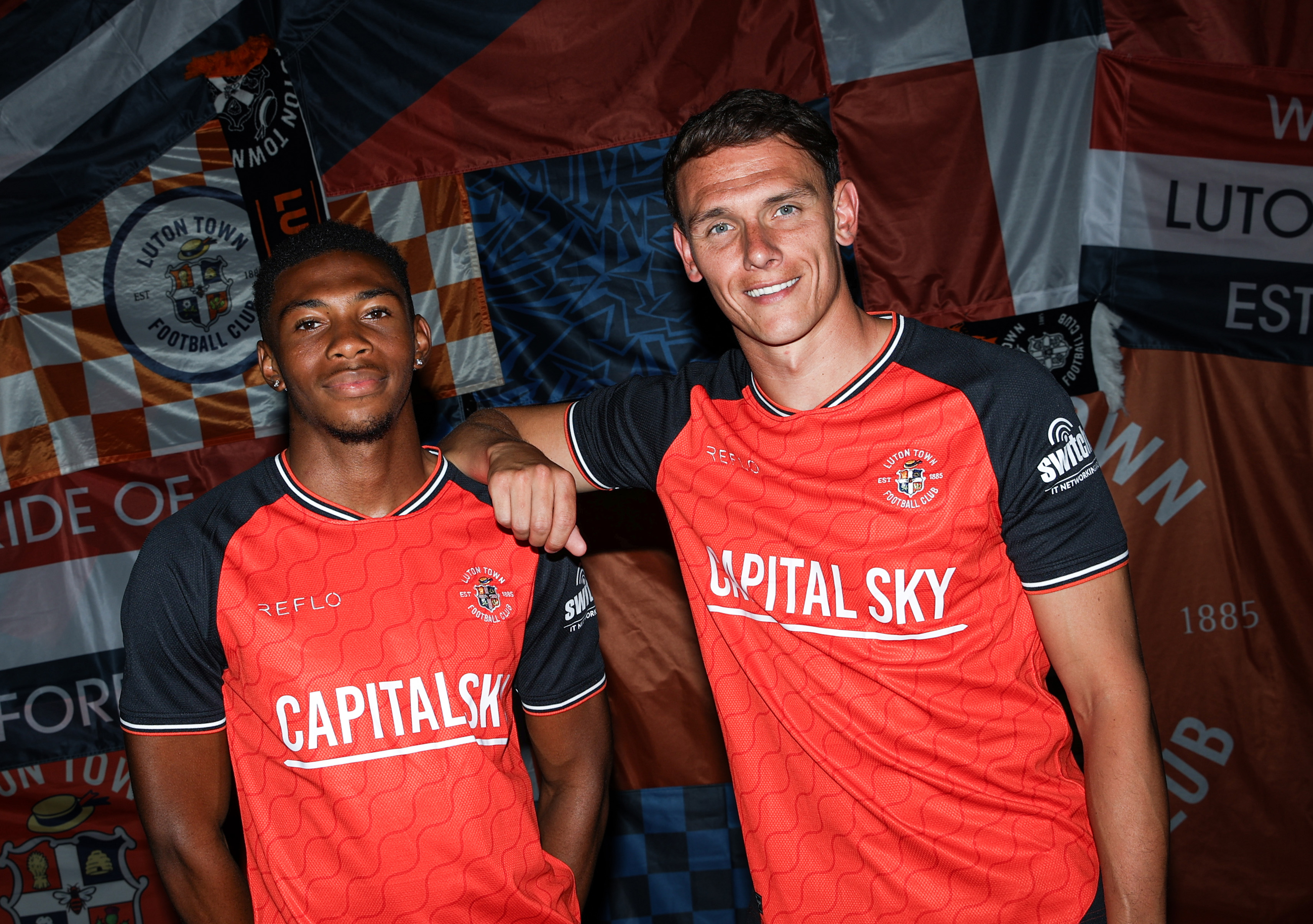 Zack Nelson and Kal Naismith model the new Reflo home shirt.