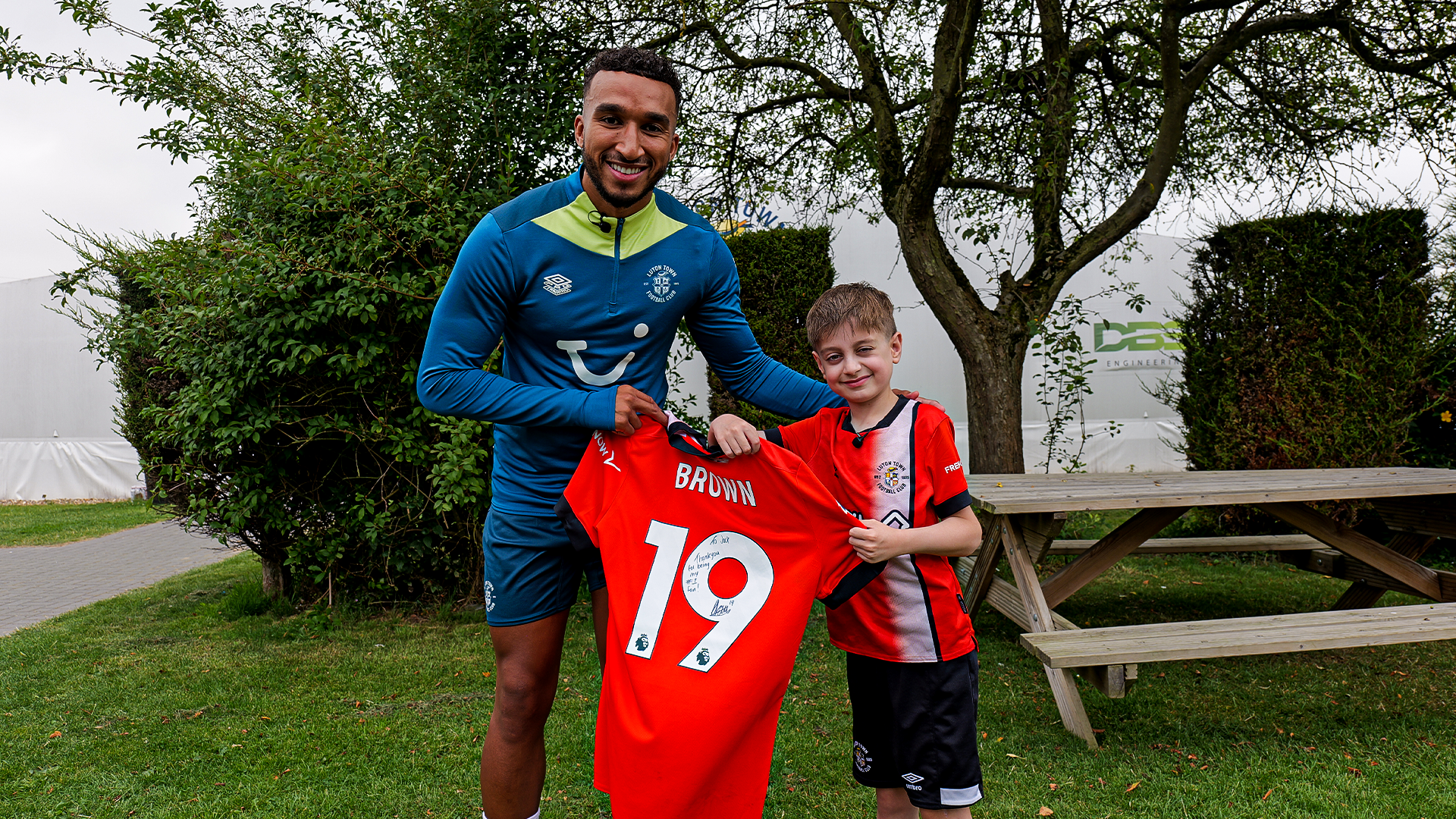 Jacob Brown and his biggest fan Jack at the Brache training ground