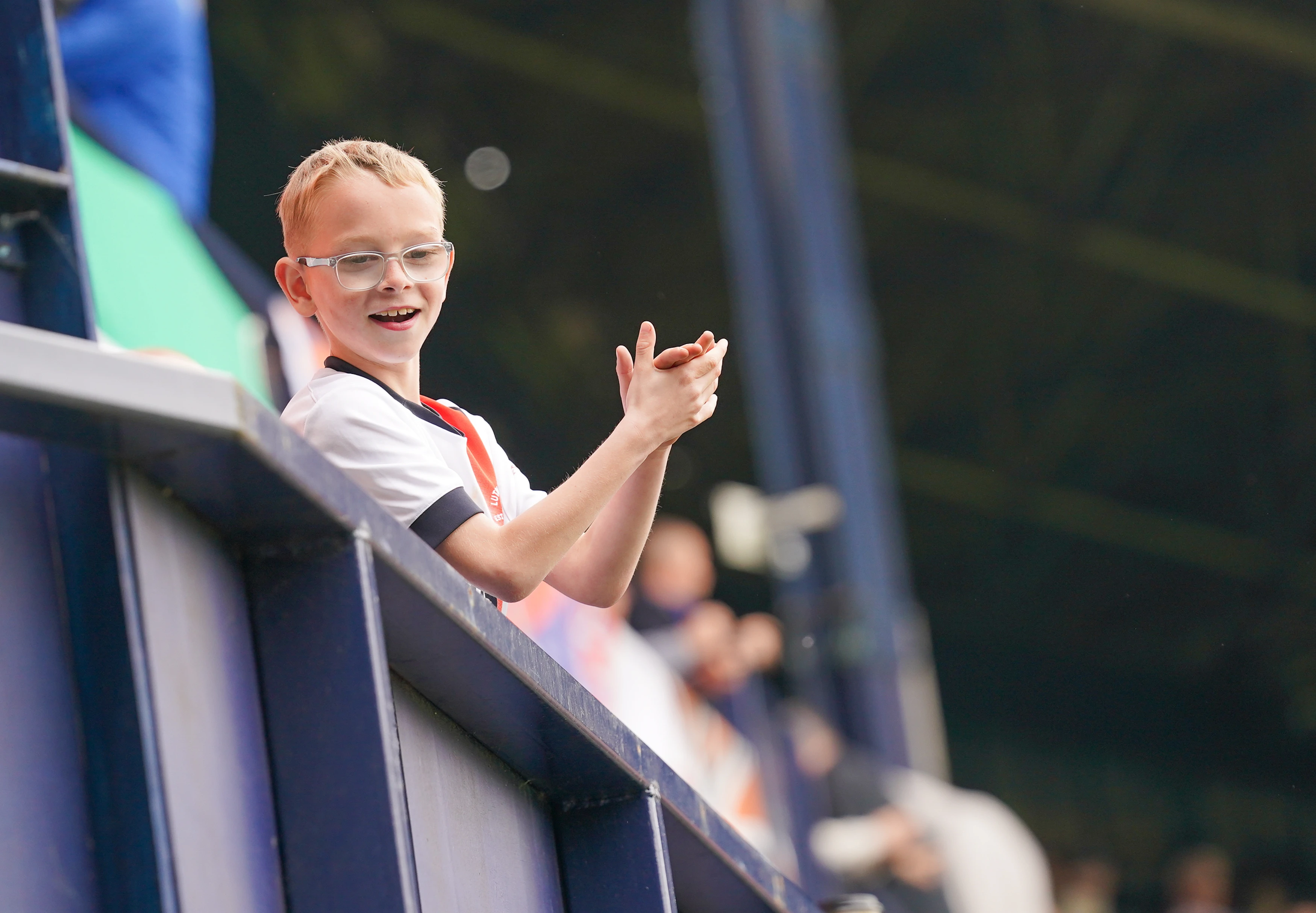 A young Luton Town supporter claps the team off at the end of the Coventry game in the 2024/25 season.