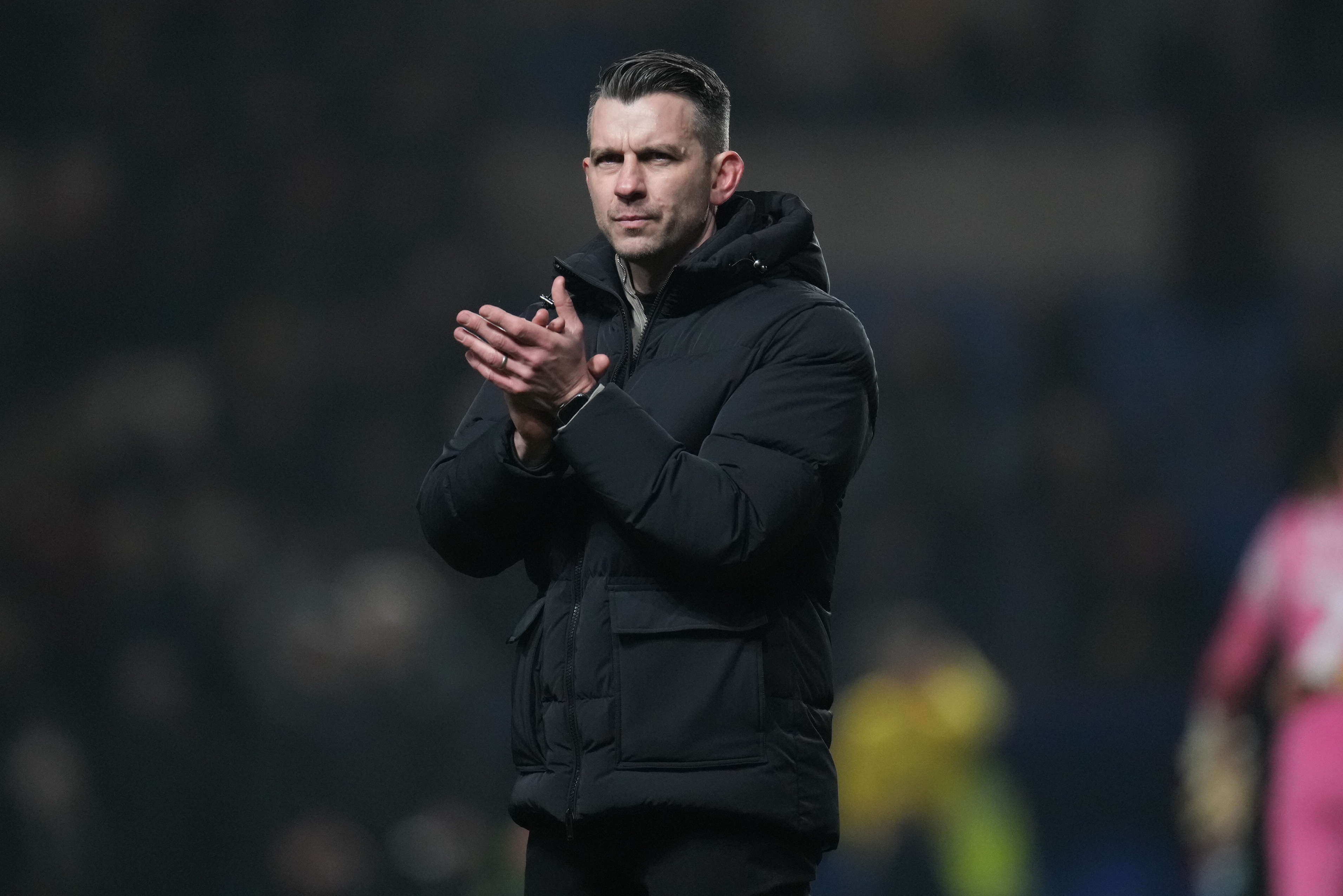Matt Bloomfield clapping the Luton fans at Oxford United.
