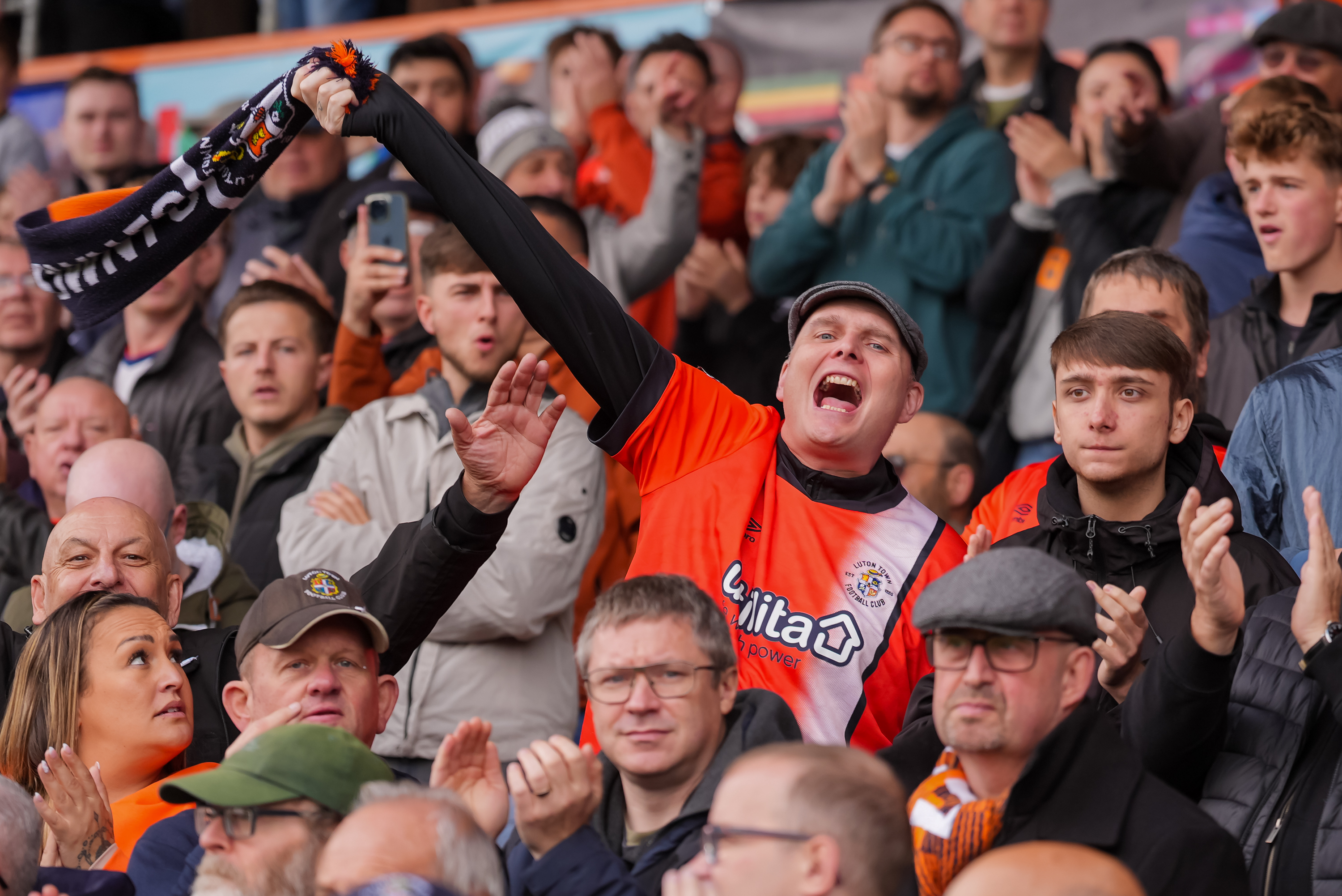 Luton Town supporters celebrate a goal in the 3-0 win over Watford at Kenilworth Road.
