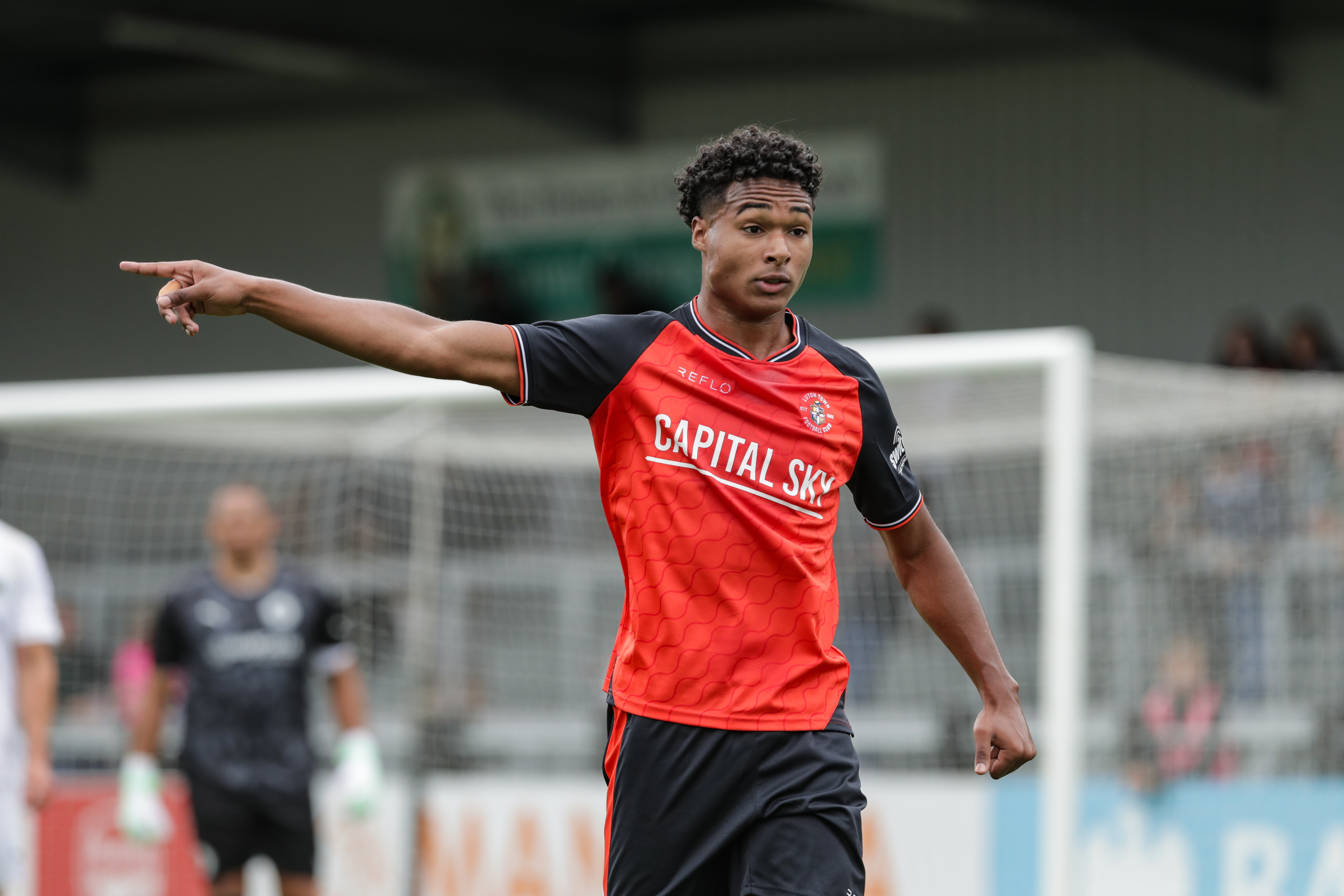 Reu Walters points as he gives instructions to a team-mate during the friendly win over Boreham Wood.