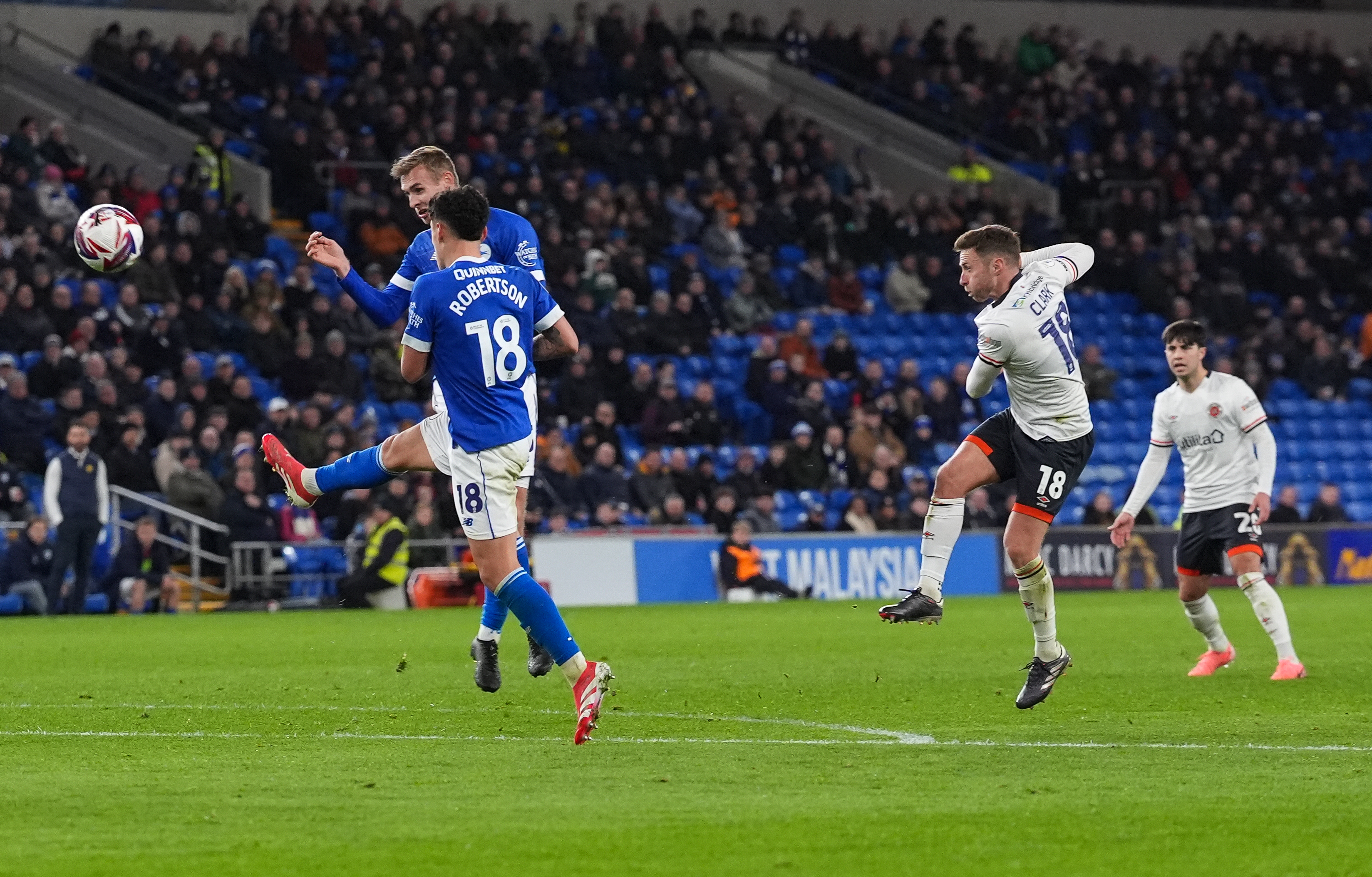 Jordan Clark lets fly with a stunning volley for the equalising goal at Cardiff City Stadium.