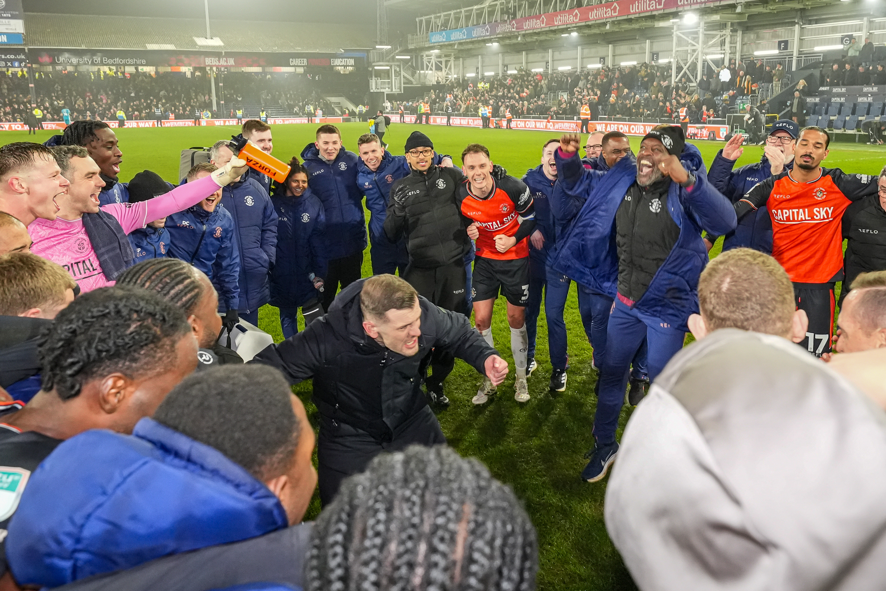 Jack Wilshere leads the post-match huddle chat after the Vertu Trophy semi-final win over Reading