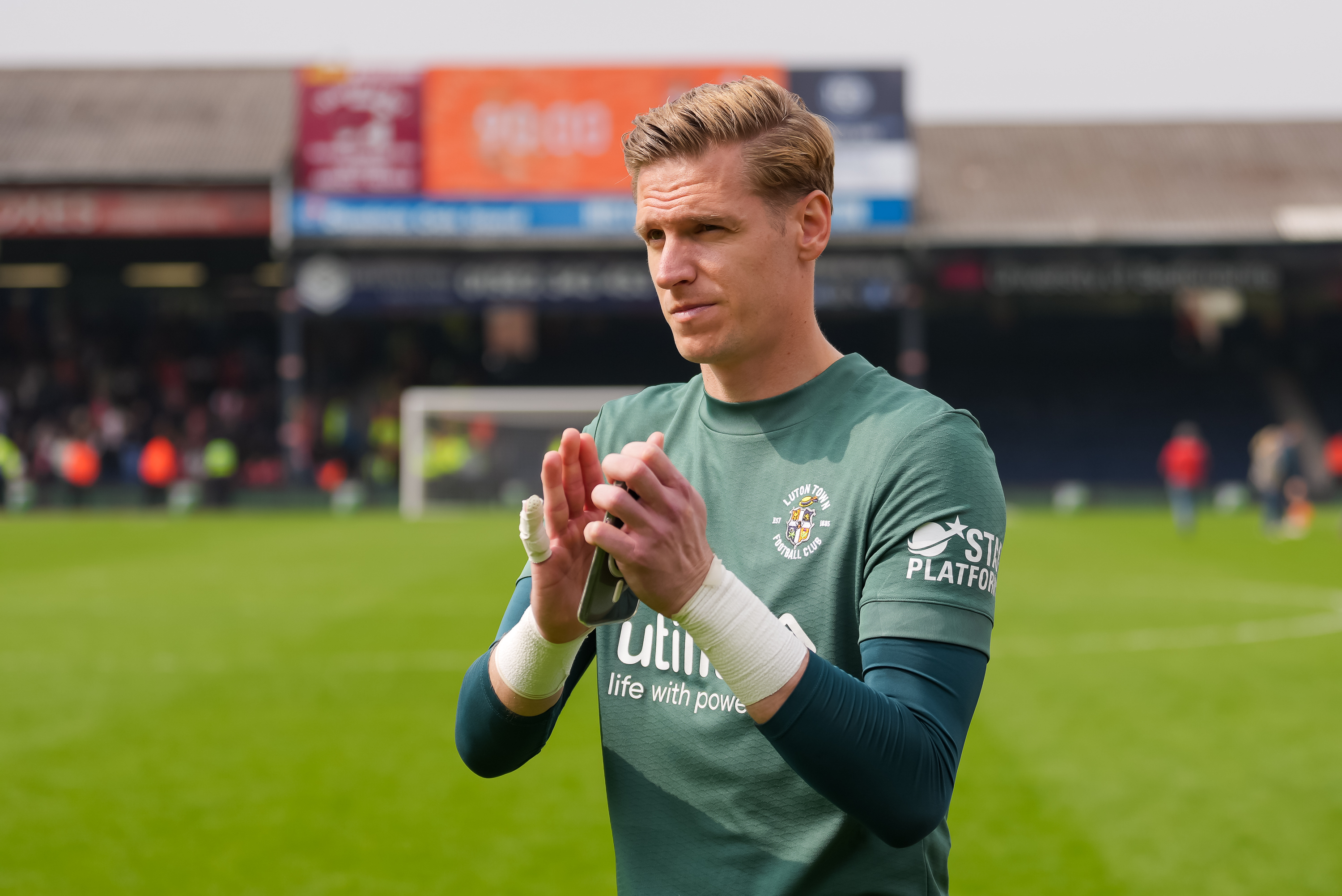 Thomas Kaminski waves to the crowd at the end of the 1-0 win over Coventry City