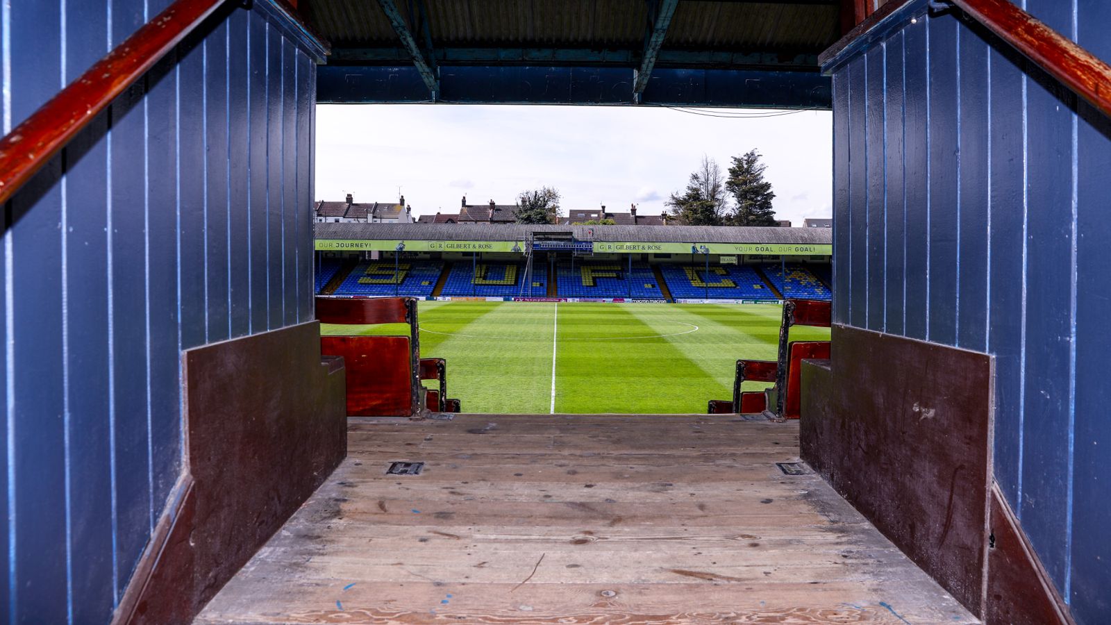 A view of Southend's pitch at Roots Hall through an entrance to the main stand.