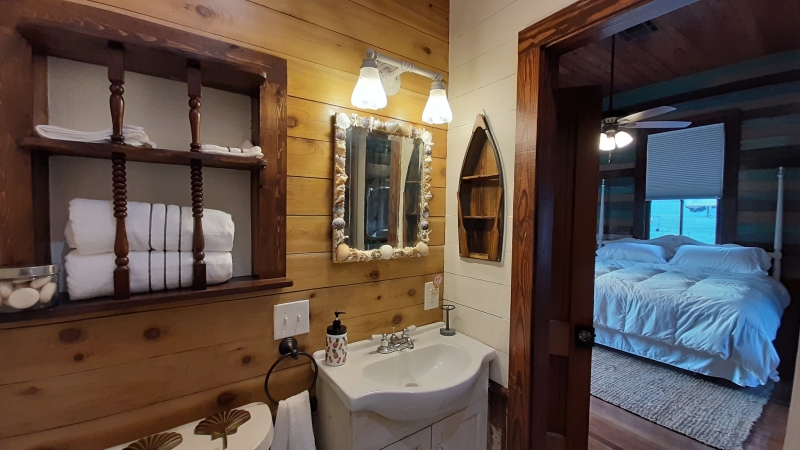 Vanity and decor in the front private bathroom