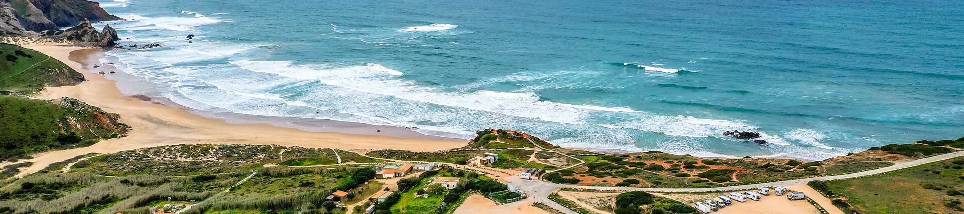 Strand Praia do Amado in Portugal. Wellen und Sand.