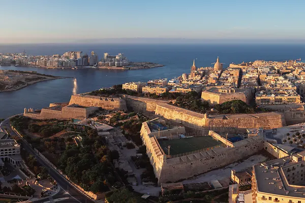 Panoramic aerial view of La Valletta downtown at sunset in Malta.