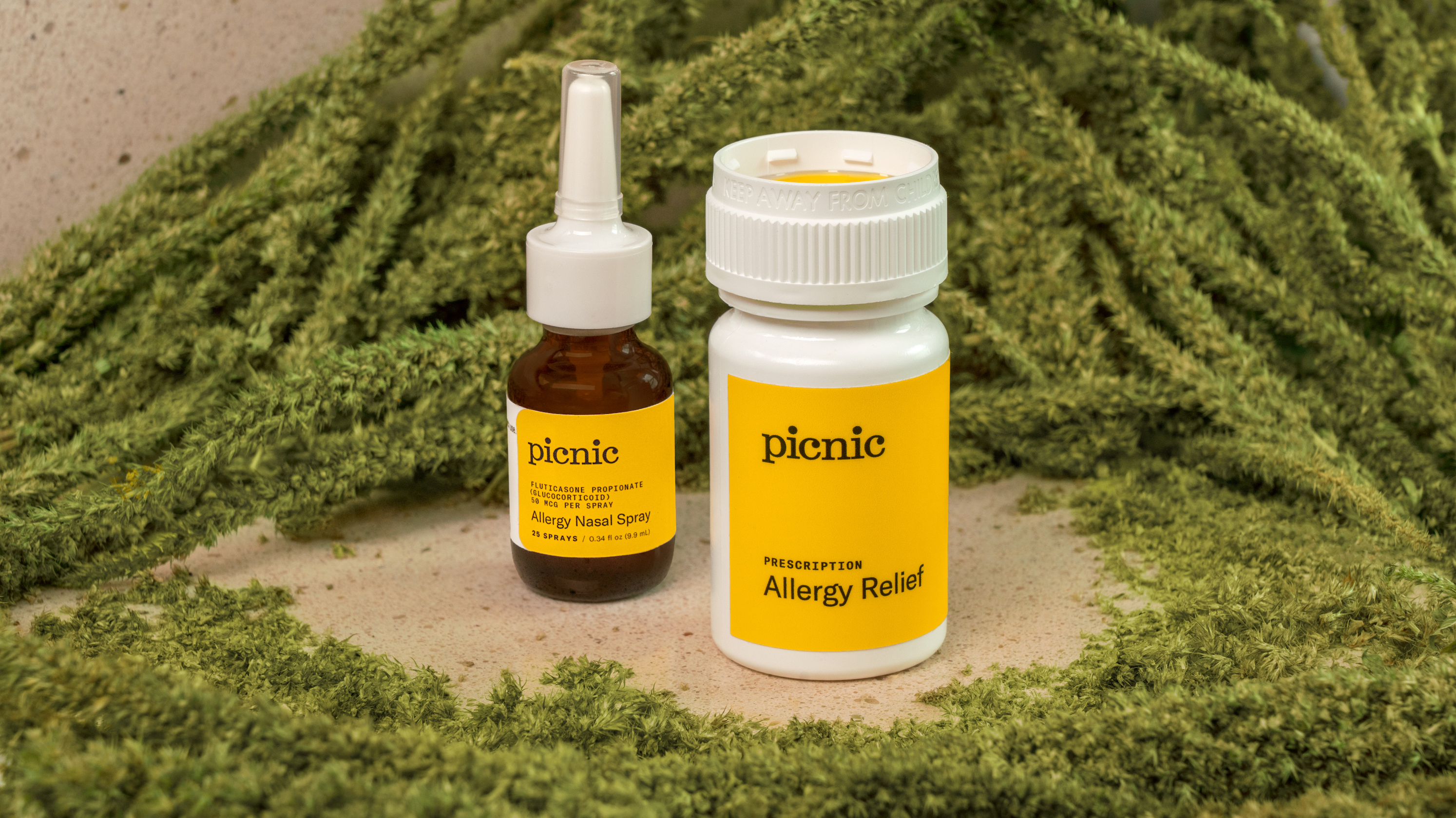 Photo of two bottles of Picnic allergy treatment surrounded by plants.