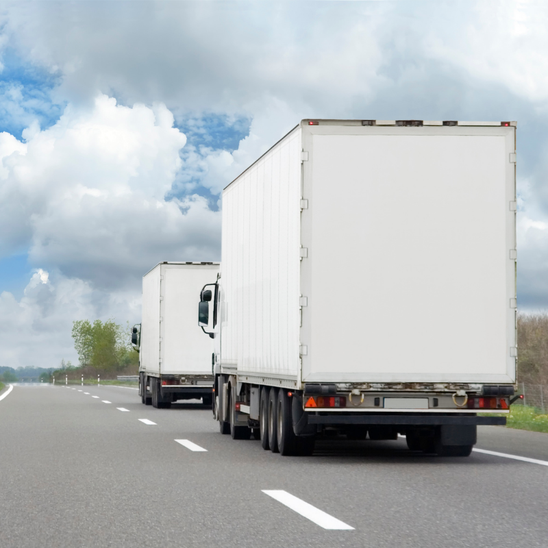 Moving truck driving down the road