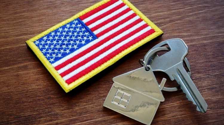 House keys with an American flag patch from a military uniform
