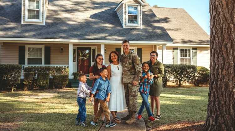 Army family of 7 outside their home