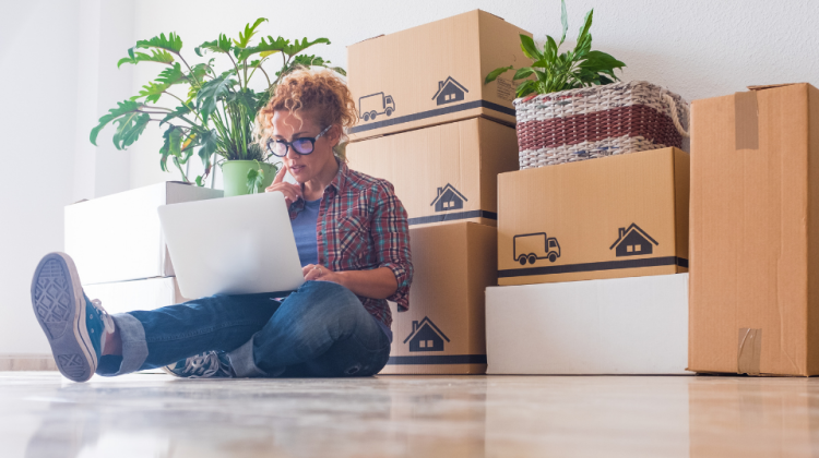 woman on computer after moving