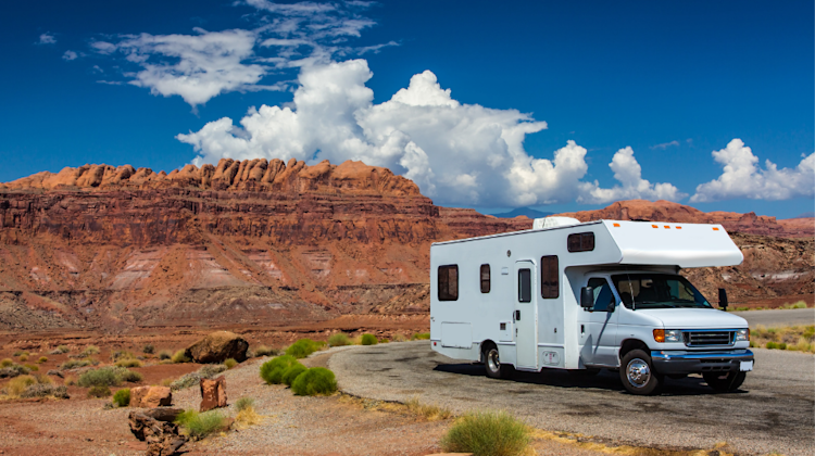 white tv parked in front of canyons