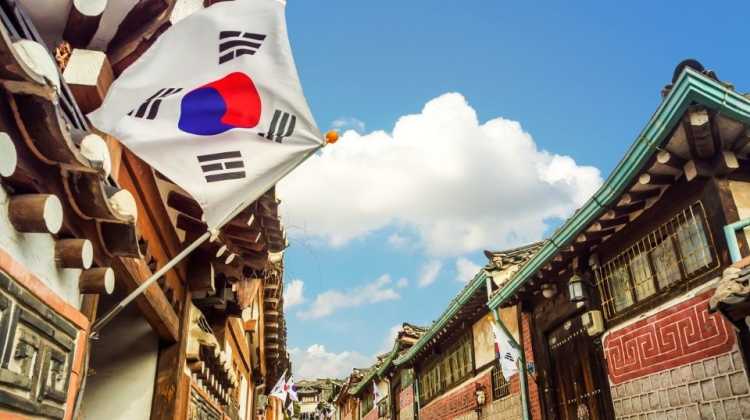 South Korean flag with historic buildings