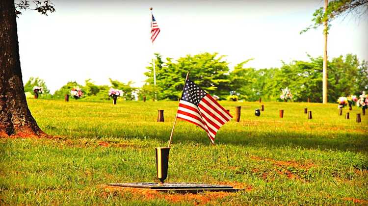 Placing American flags on veteran graves is a simple way to honor military sacrifices on Memorial Day