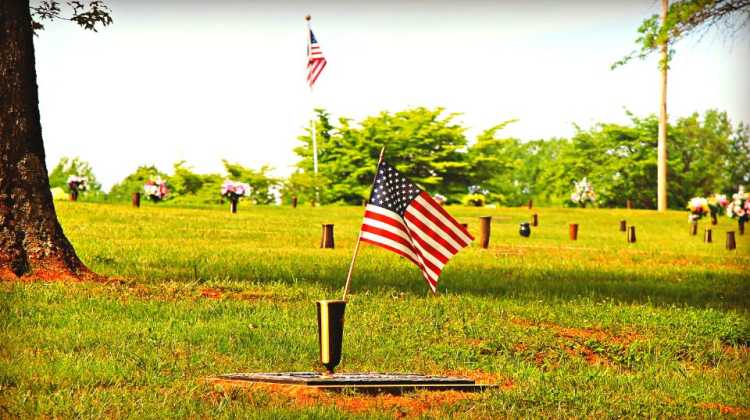 Placing American flags on veteran graves is a simple way to honor military sacrifices on Memorial Day