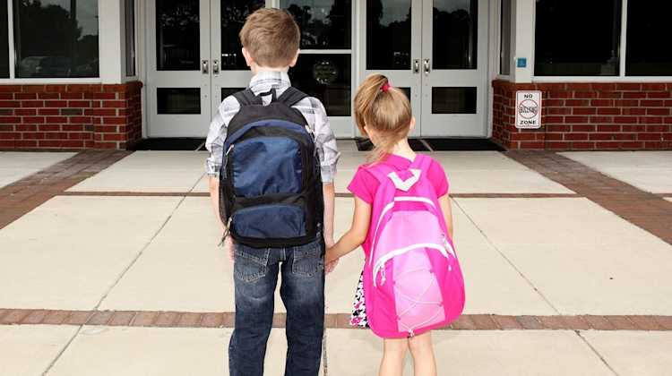 children walking toward school