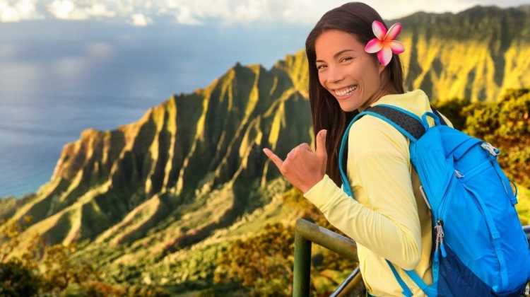 girl hiking in Hawaii with backpack