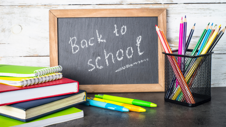 back to school sign and supplies