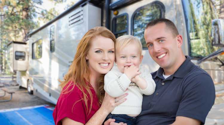 Family in front of an RV