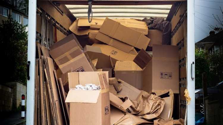 back of moving truck filled with empty boxes