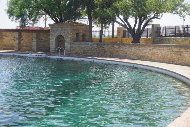 The Balmorhea swimming area has diving boards, ladders, and shade available to spend a day swimming in crystal blue water ranging from 3 to 25 ft.