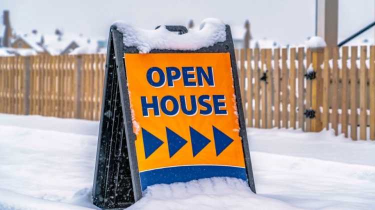 Open House real estate sign in light snow