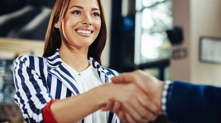 woman shaking hands