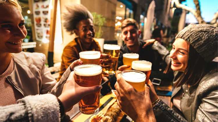 friends and military spouses toasting with beer at great breweries in Seattle