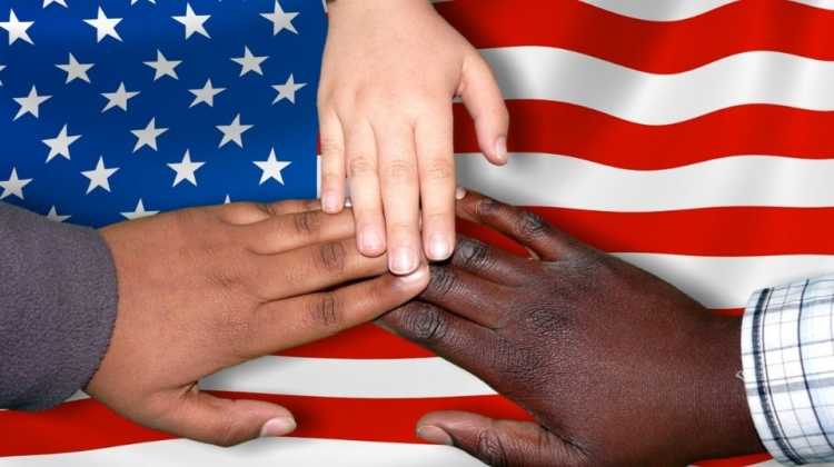 family hands over a flag