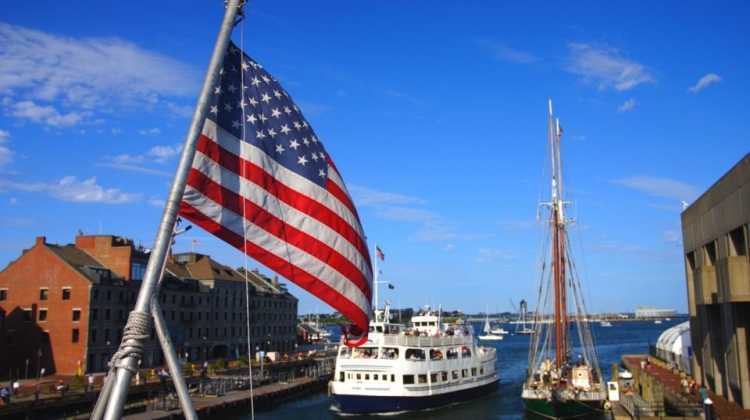 photo of flag on boat in Boston harbor