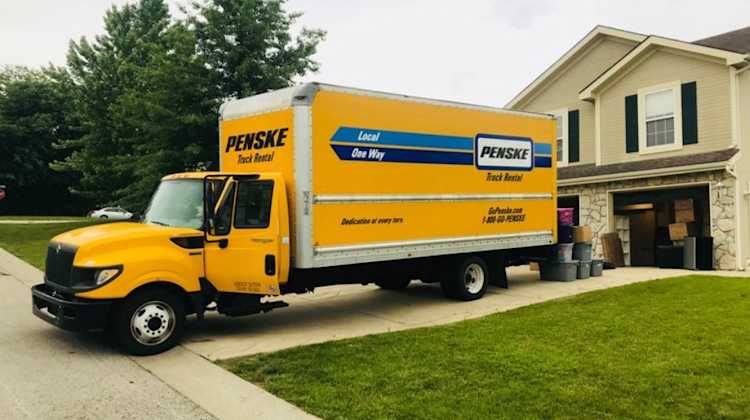 moving truck in driveway, military family learns how to file an inconvenience claim after a military move