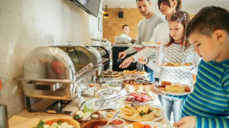 a military family saves money on food while PCSing by eating breakfast at a hotel buffet