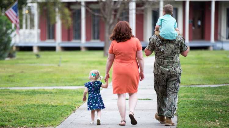 military family walking away