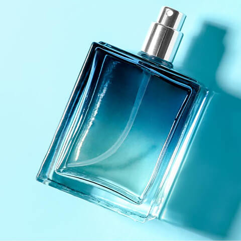 a blue bottle of perfume