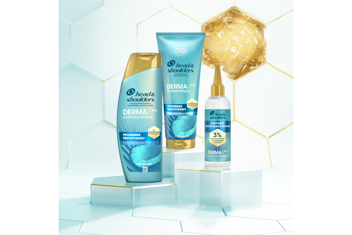 Head & Shoulders Dermaxpro Pflegende Feuchtigkeit Shampoo, Pflegespülung und Kopfhausmaske neben Kokosnuss- und Aloestückchen